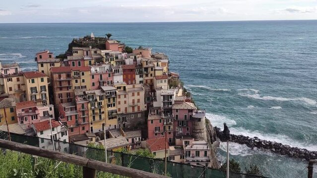 Seacoast of Cinque Terre with its villages and nature in Italy during a gloomy day of spring
