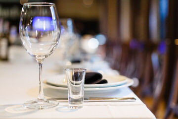 Served dinner table in a restaurant. Restaurant interior