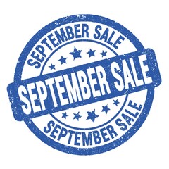 SEPTEMBER SALE text written on blue round stamp sign.