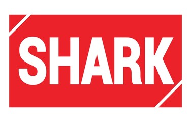 SHARK text written on red stamp sign.