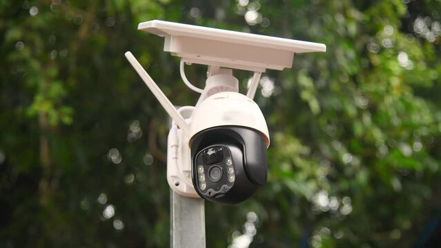 Solar cells panel used energy with motion speed Wi-Fi dome IP CCTV 4G solar camera with sim card system technology signal for looked around security area for safety concept.