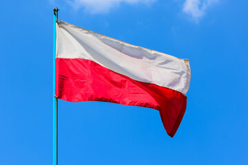 The flag of Poland is a rectangular banner, which is divided into two equal horizontal halves: the top - white, and the bottom - red