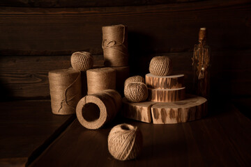 Obraz na płótnie Canvas Jute threads materials for crocheting on dark background