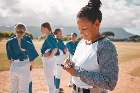 Baseball notes, sports game and woman in collaboration with team on field, writing strategy for performance in competition and planning goal on paper. Sport coaching leader working on plan at match - Powered by Adobe