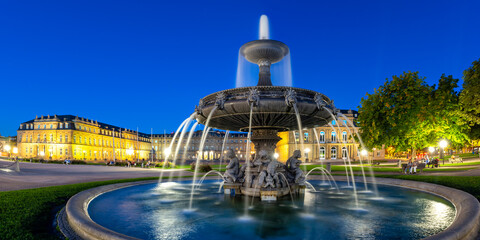 Stuttgart Castle square Schlossplatz Neues Schloss with fountain travel panorama by night in Germany