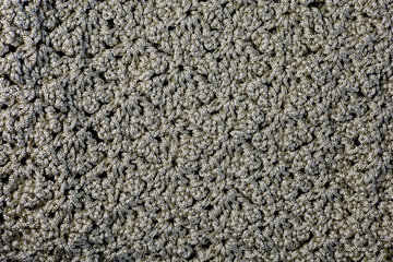 close-up of shiny thread textured gray green fabric