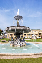 Fototapeta na wymiar Stuttgart city Castle square Schlossplatz with fountain travel portrait format in Germany