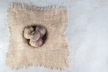 Fresh red beetroots vegetables on a sackcloth