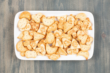 Delicious fresh crackers on a white plate