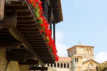 Colourful flowers on balconies, Santillana del Mar, Spain