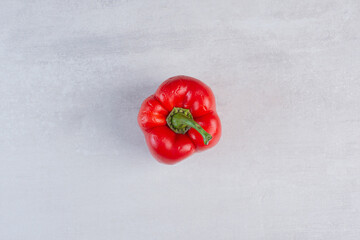Organic red pepper on marble background