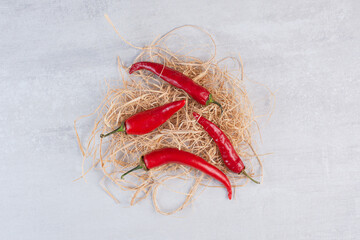 Red chili peppers on stone background