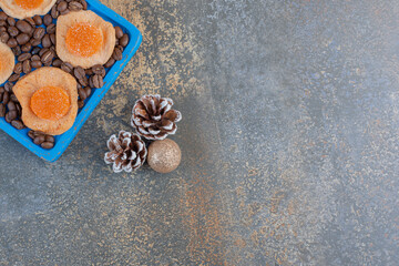 Dried slices of fruit with jelly candies and coffee beans