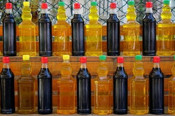 Closeup view of a farmer's market in Bursa, Turkey selling homemade olive oils in daylight