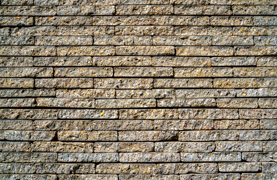 Background from wall of broken concreet paving stones
