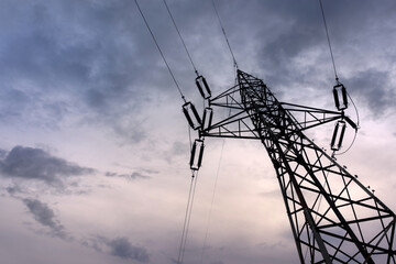 A transmission tower, also known as an electricity pylon. The concept of the energy crisis.