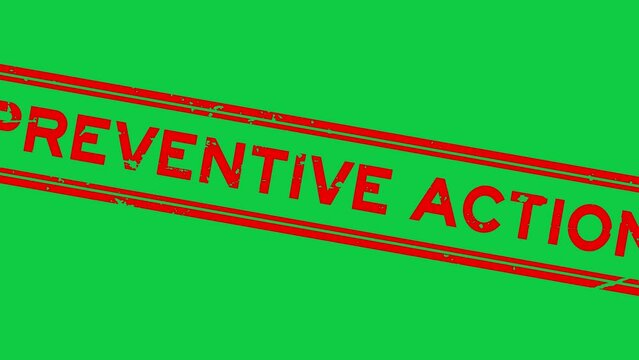 Grunge red preventive action word square rubber seal stamp zoom on green background