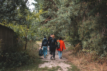 Fototapeta premium friends go mushroom hunting