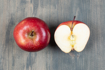 Red fresh apples on marble background