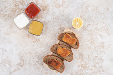 Fried chicken nuggets with sauces and spices