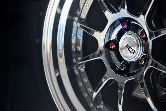 Berlin - August 2022: SSR SP3 SBC Car's Rim detailing with SPORTS INSPIRED Center Cap selective focus shot with copyspace.