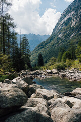 River flowing in Val Di Mello, Sondrio, in Lombardy, Italy