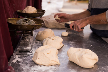 Fototapeta premium process of making bread. dough kneading