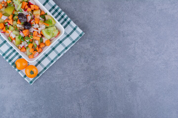Seasonal mixed vegetable salad in a platter
