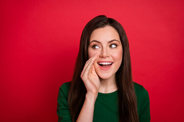 Photo of cunning cute lady hairstyle hold arm near mouth tell secret dressed stylish green outfit...