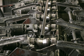 Plant for the production of metal pipes. Workshop with mechanical tools and equipment, rolls of...