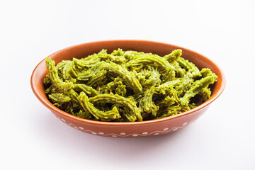 Palak Chakli sticks or Spinach Murukku pieces, healthy Indian festival or tea time snack