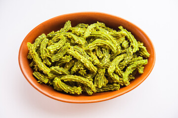 Palak Chakli sticks or Spinach Murukku pieces, healthy Indian festival or tea time snack