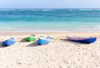 Empty kayaks on the sand at Pantai Pandawa Beach, Bali