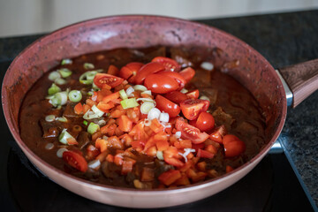 fresh cooking at home - goulash from game meat with vegetables