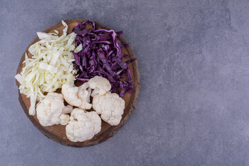 Chopped white and purple cabbage with cauliflowers