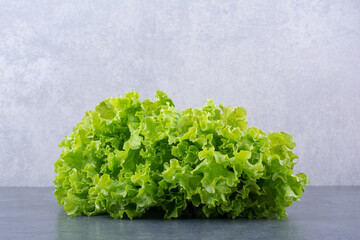 Green lettuce leaves isolated on the background
