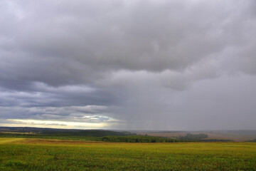 Fototapeta na wymiar Autumn rain over the Ural expanses