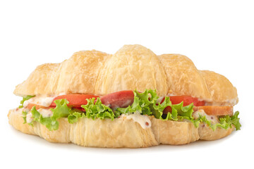 Croissant sandwich sausage and fresh tomato isolated on white