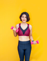 asian woman work out with dumbbel on isolated background