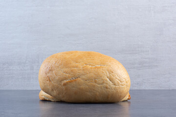 Two buns displayed on marble background