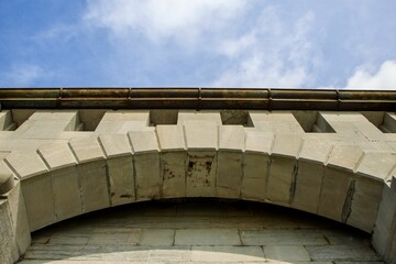 Low angle shot of a stone arch detail on the Martello tower, Wales