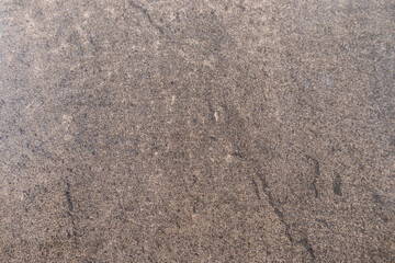 Background of vintage stone tile surface with a decorative canvas pattern