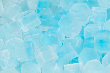 Blue ice cubes background texture. freshness. freezing. pieces of ice close up