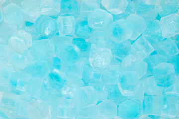 Blue ice cubes background texture. freshness. freezing. pieces of ice close up