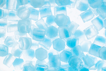 Blue ice cubes isolated white background. freshness. freezing. frozen pieces of ice close up