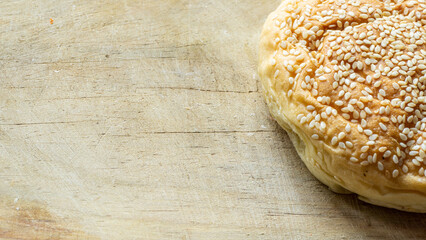 The homemade bread rolls with sesame seeds. Burger buns with sesame seeds, ingredients for hamburger.