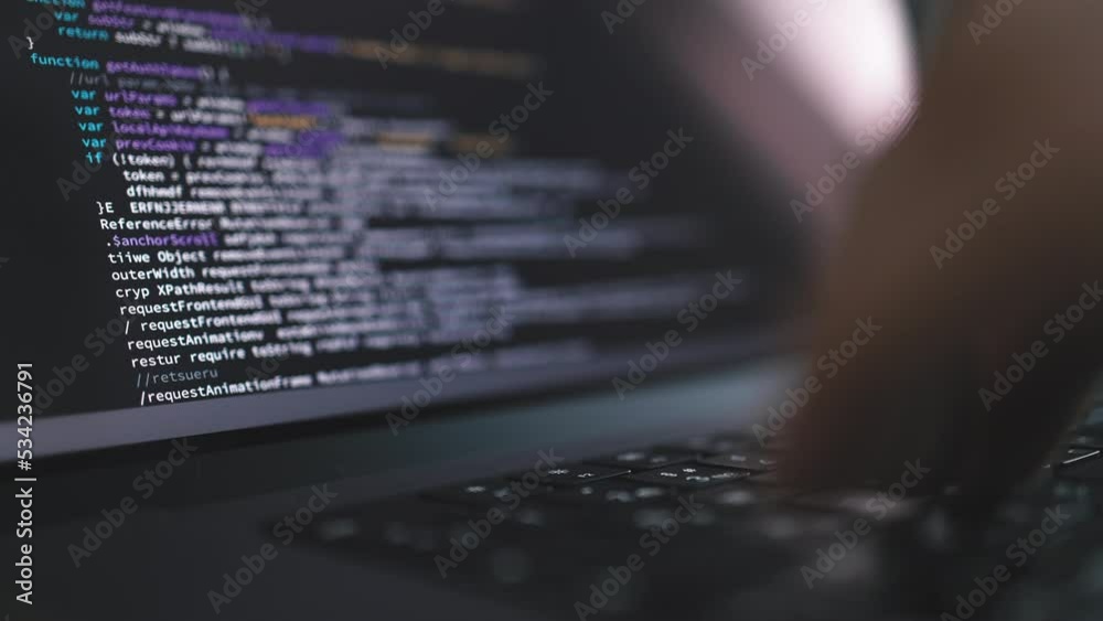 Wall mural macro view of laptop screen with code writing, programmer coding software in office
