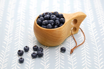 Kuksa(Finnish wooden mug) and fresh blueberries