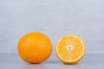 Fresh slices of orange on white background