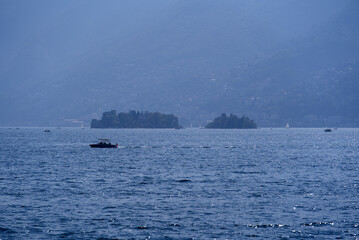 Brisago Islands seen from village Ascona, Canton Ticino, on a sunny summer day. Photo taken July 24th, 2022, Brisago Islands, Switzerland.